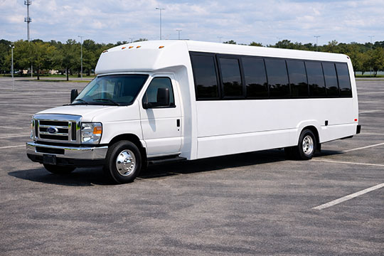 25-passenger minibus available for charter in Claude, TX