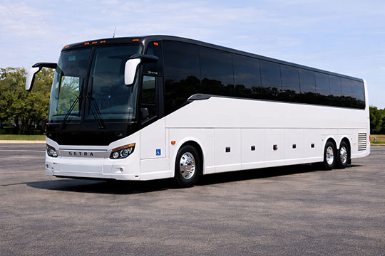 56-passenger charter bus available for charter in Claude, TX